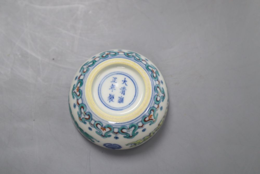 Two Chinese blue and white export plates, a blue and white miniature vase, a dish and bowl